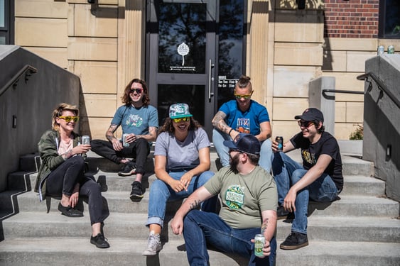 The team at Sloans Lake Taproom enjoy a sunny break